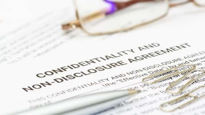 Large Enterprises Targeted in Fake Merger & Acquisition Scams 1 NDA William Potter Getty Md89u9