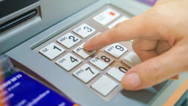 Venezuelan Cartel's Malware Honcho Nabbed for ATM Jackpotting 2 atm keypad pressing buttons Makhh shutterstock G6Ef1U